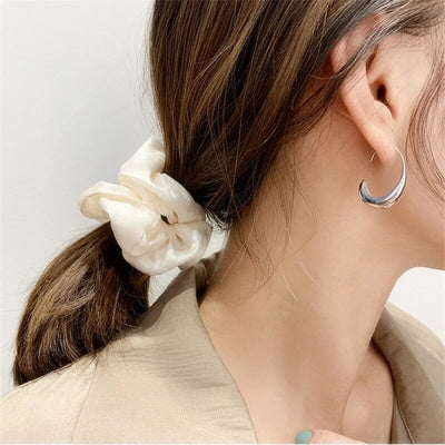 Gold and silver earrings